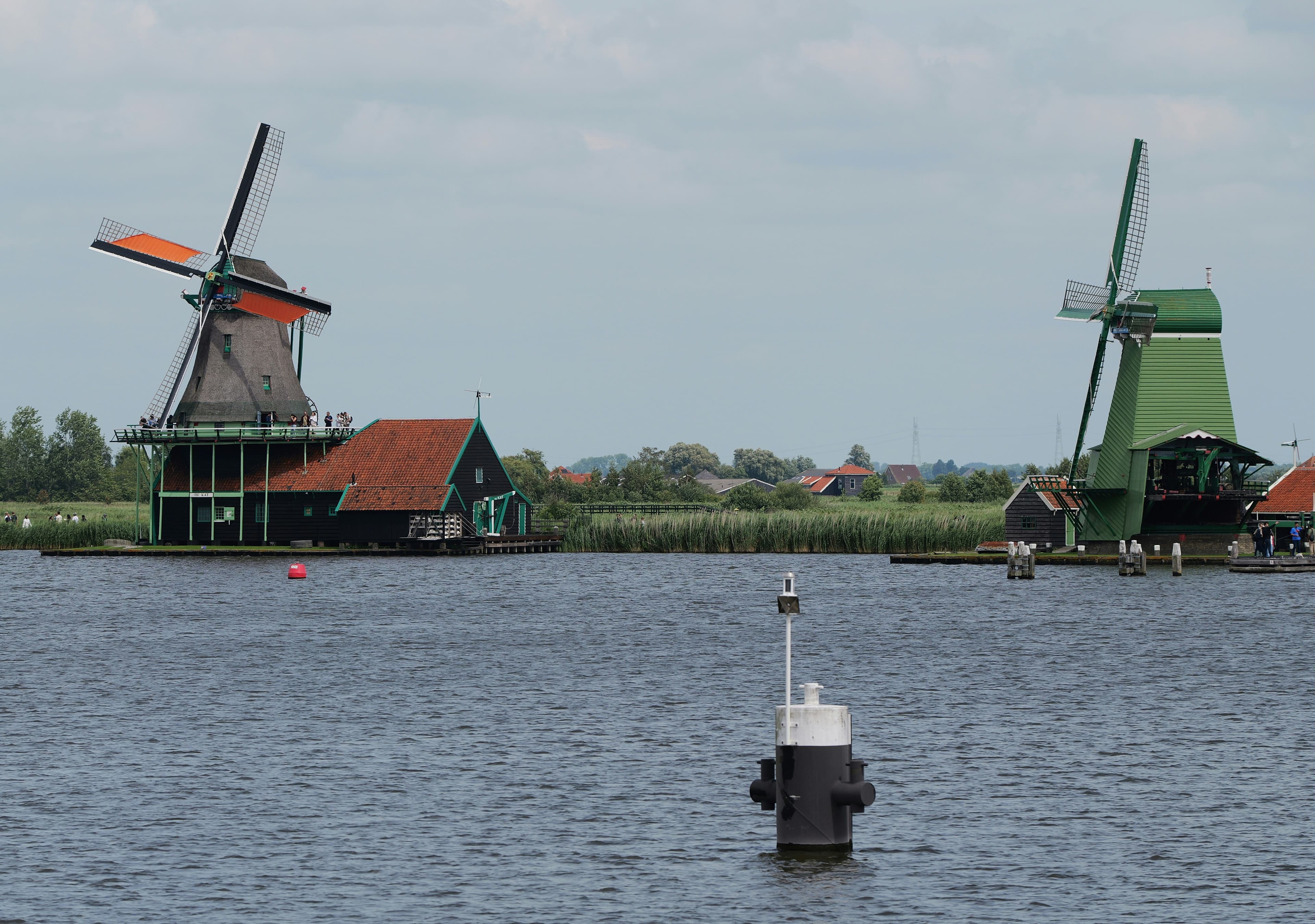 Step Back in Time at Zaanse Schans: Iconic Dutch Windmills and Traditional Village Charm